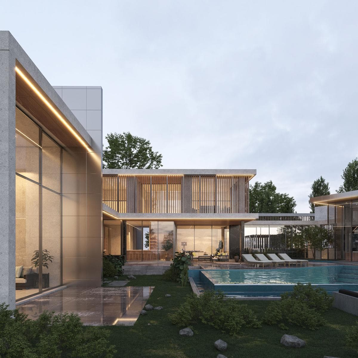 Residencia contemporánea con jardín y alberca al atardecer